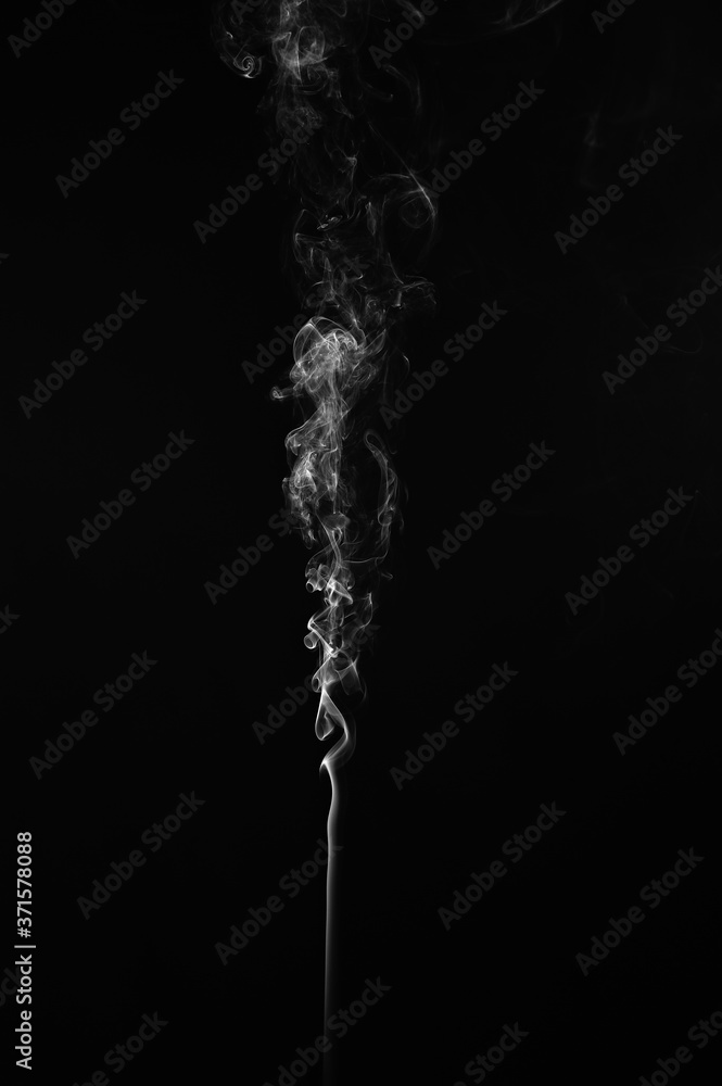 Abstract smoke moves on a black background. Design element. Abstract texture. Abstract smoke moves on a black background. Design element. Abstract texture.