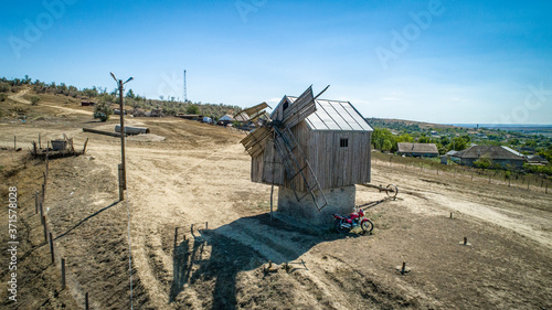 ruined old wooden windmill located in   Beshalma village, Gagauzia, Moldova photo