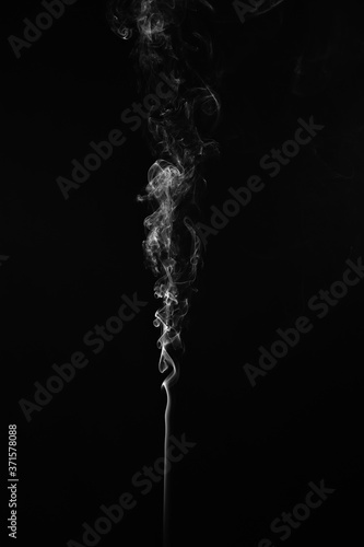 Abstract smoke moves on a black background. Design element. Abstract texture.