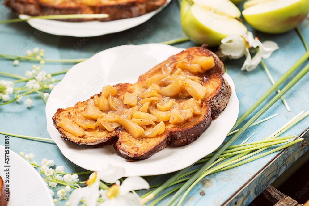 Sandwich with baked slices of apples and flowers Sandwich with baked slices of apples and flowers