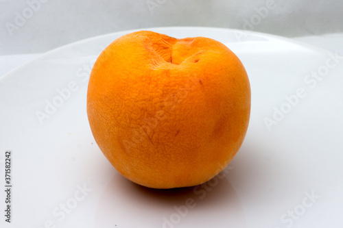 An appetizing and tasty peach.