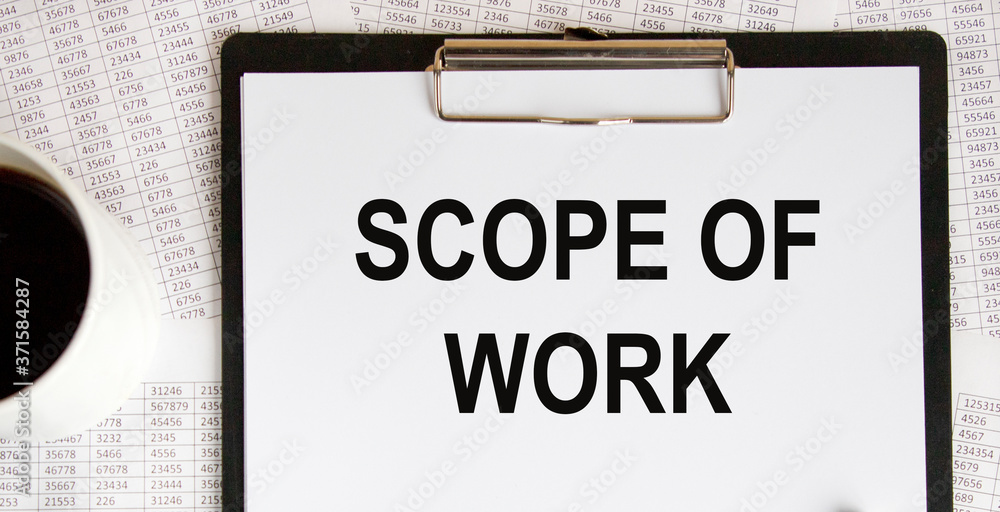 Scope of work. inscription on a white business card against the background of financial charts of a pencil and money. BUSINESS CONEPT Scope of work. inscription on a white business card against the background of financial charts of a pencil and money. BUSINESS CONEPT