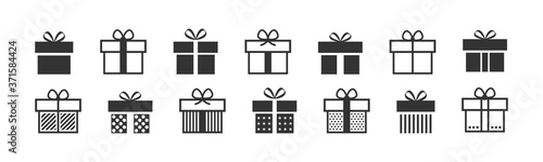 Gift box icon. Present symbol. Christmas box. Surprise with gift box in flat style. Set with gift in linear style. Vector photo