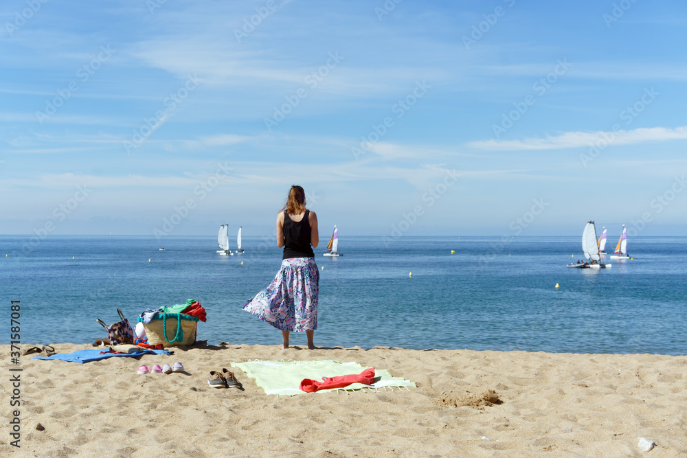 Woman silhouette in La Turballe beach