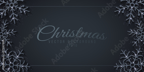 Christmas background with silver glittering snowflakes on a dark background. Greeting card for your festive design. Vector illustration.