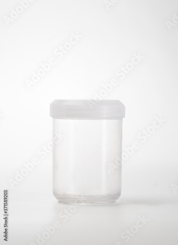 urine bottle over white background mockup