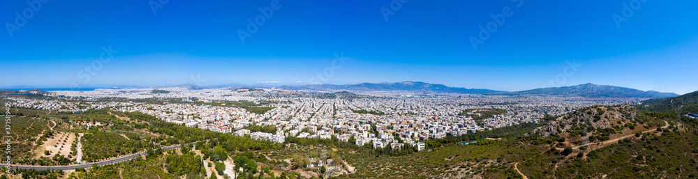 Athens Greece panorama. Aerial view of Athens city from Hymettos mount, sunny summer day.