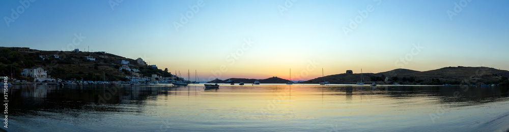 Kea Tzia island, Cyclades, Greece. Panorama of Vourkari marina at sunset. Kea Tzia island, Cyclades, Greece. Panorama of Vourkari marina at sunset.