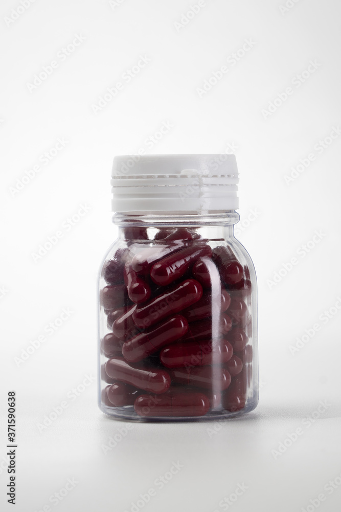 caplets medicine bottle isolated on white background. caplets medicine bottle isolated on white background.