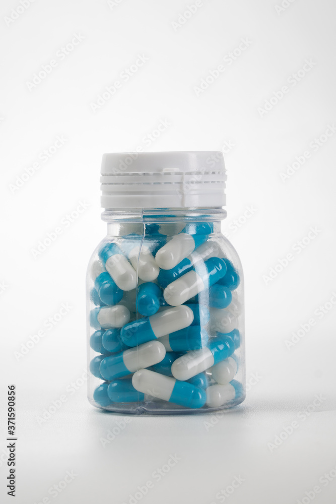 caplets medicine bottle isolated on white background. caplets medicine bottle isolated on white background.