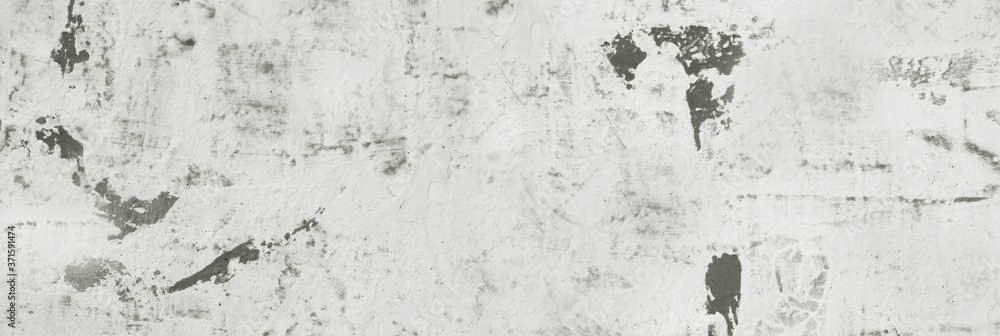 Fototapeta premium Concrete wall. Weathered old paints on the spilled wall.