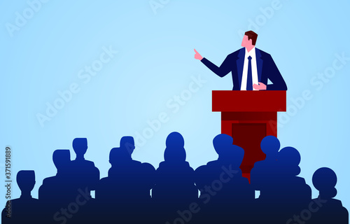 Male businessman standing on the podium making speech report