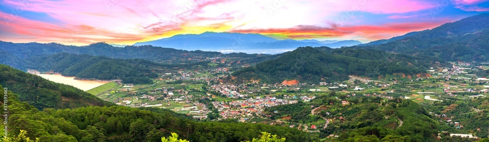 Small town in the valley at dawn, where mountains are crossed by beautiful passes in the highlands of Vietnam