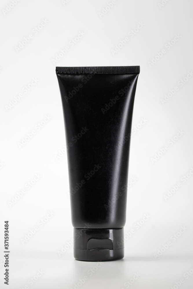 Tube pouch standing black plastic product mockup. over white background Tube pouch standing black plastic product mockup. over white background