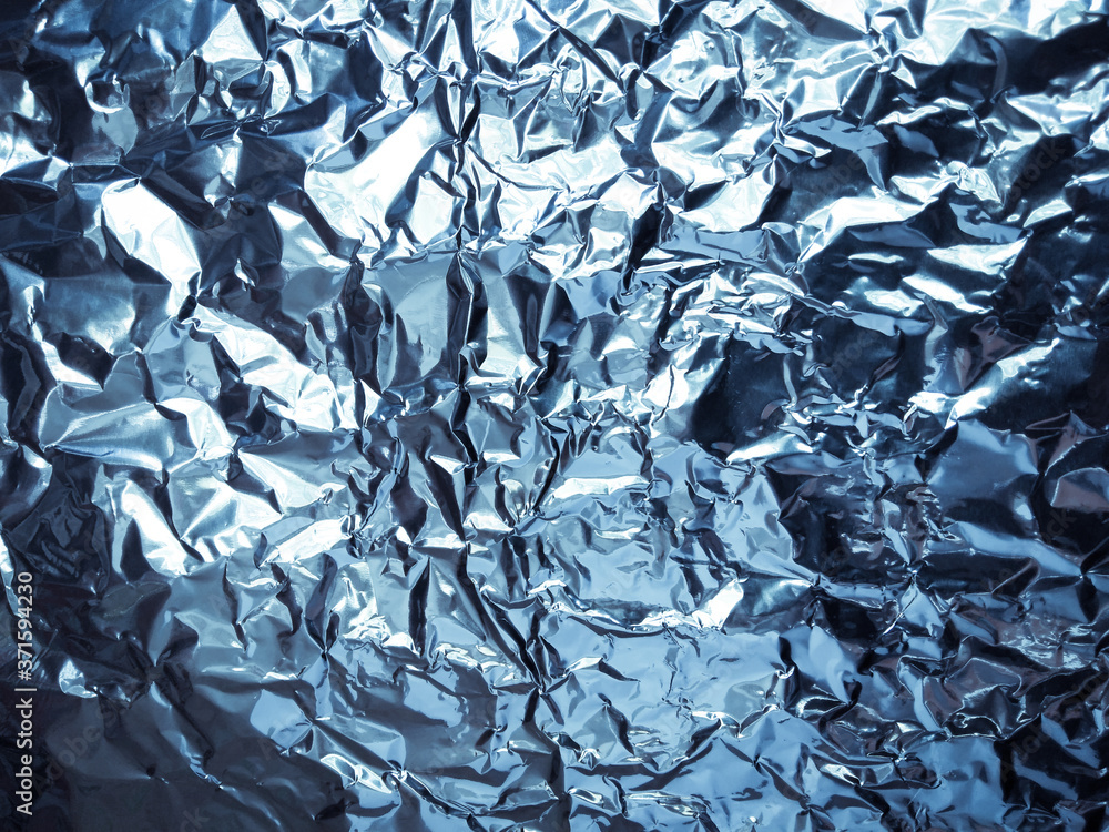 Abstract texture pattern metallic paper using as a background or wallpaper. Metal aluminum foil shiny and reflector Abstract texture pattern metallic paper using as a background or wallpaper. Metal aluminum foil shiny and reflector