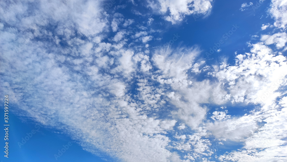 Blue sky background with clouds. Nature background. Blue sky background with clouds. Nature background.