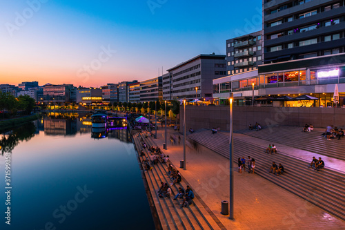 Saarbrücken at night with bridge and river