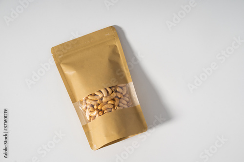 Photography blank standing pouch mockup laying over white background