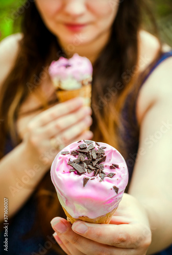 Ice cream in the hands of the girl
