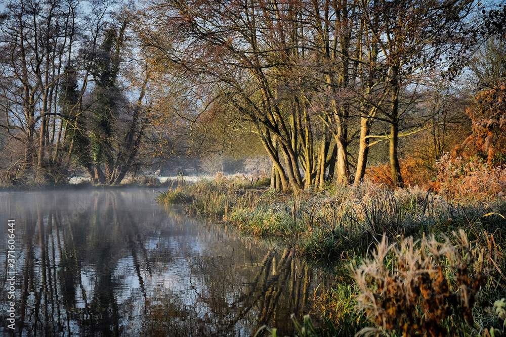 Morning mist and frost on the River Wey, Surrey, on a cold winter's morning Morning mist and frost on the River Wey, Surrey, on a cold winter's morning