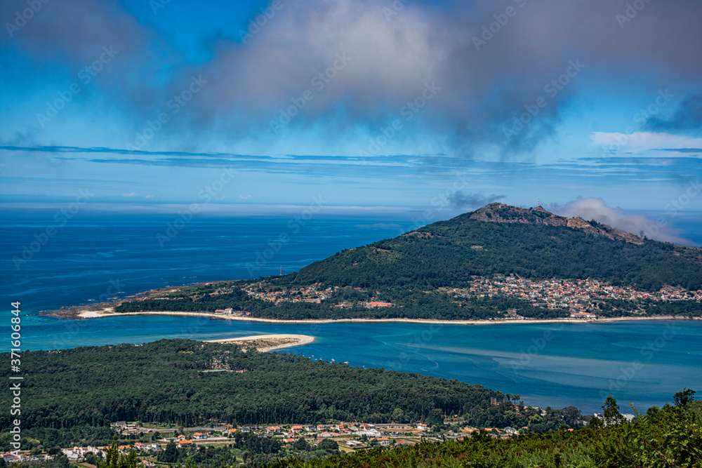The Minho River Flowing Into The Atlantic Ocean, From Caminha, Portugal, With Spain On The Opposite Side