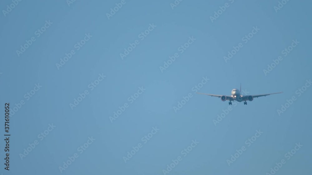 Widebody airplane approaching before landing Widebody airplane approaching before landing