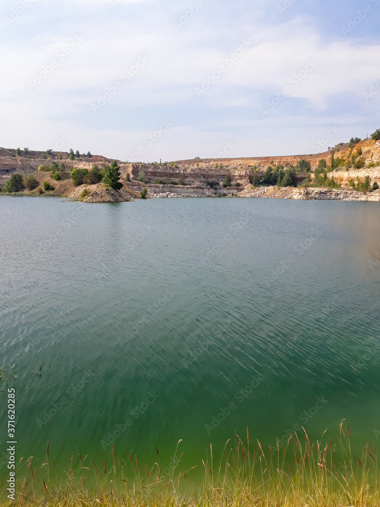 a picturesque lake in an abandoned quarry