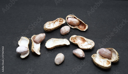 Group of peanuts isolated on black background
