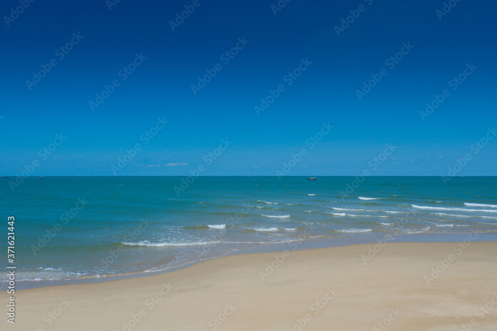 Fototapeta premium The beach with blue sky.