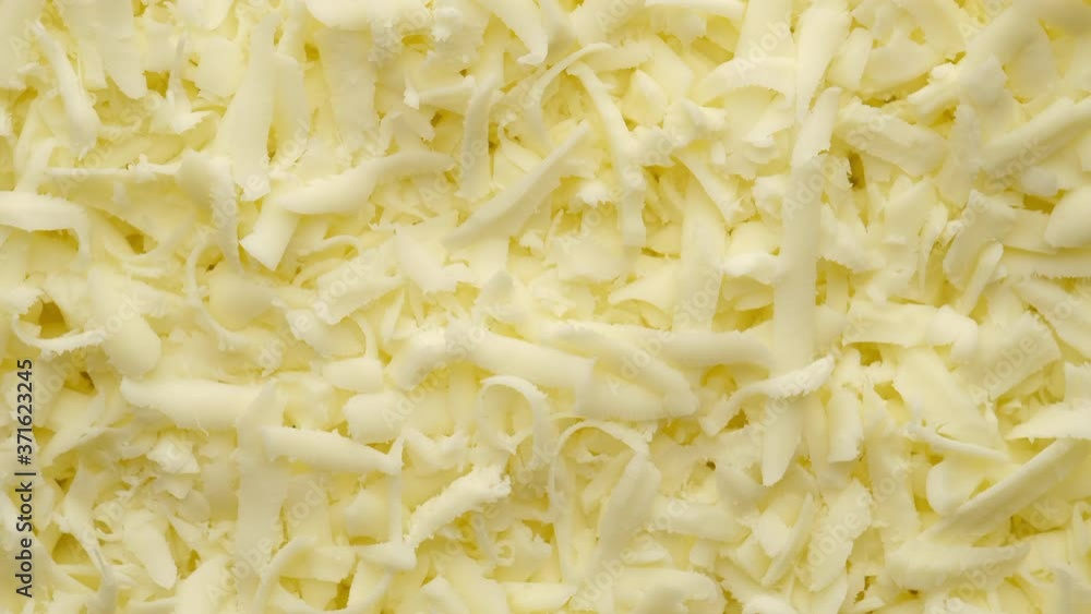 mozzarella. grated mozzarella cheese rotating top view. grated mozzarella cheese for pizza mozzarella. grated mozzarella cheese rotating top view. grated mozzarella cheese for pizza