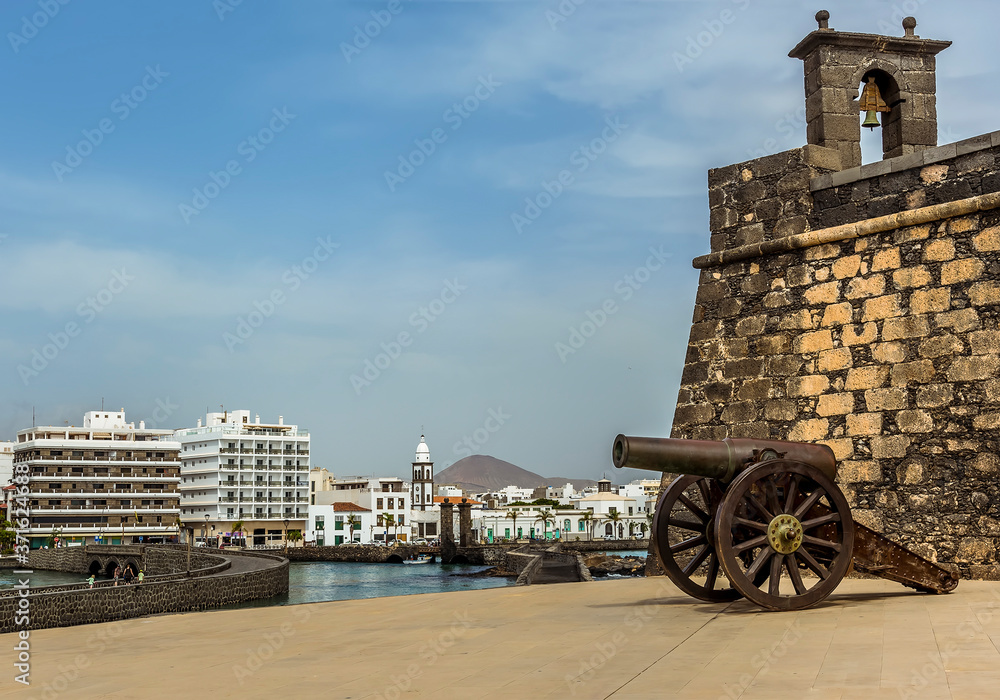 A view of the Islet of the English, the Castle of Saint Gabriel and the shoreline of Arrecife, Lanzarote on a sunny afternoon