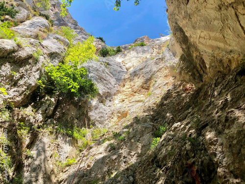 a rope on the rock for climbing