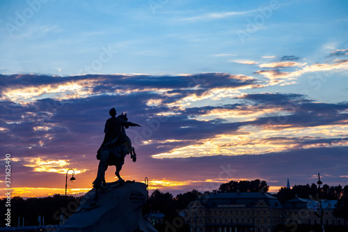 Bronze horseman monument illuminated sunset. Unique urban landscape center Saint Petersburg. View Neva River. Central historical sights city. Top tourist places in Russia. Capital Russian Empire