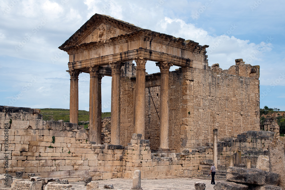 Fototapeta premium Thugga Tunisia, view of the Capital building against a cloudy sky