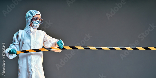 Quadro su tela quarantine and pandemic concept - healthcare worker in protective gear or hazmat
