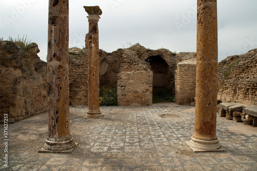 Thuburbo Majus Tunisia, roman ruins with columns and mosaic floor photo