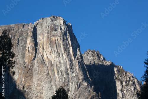 Yosemite Mountains with snow against a blue sky