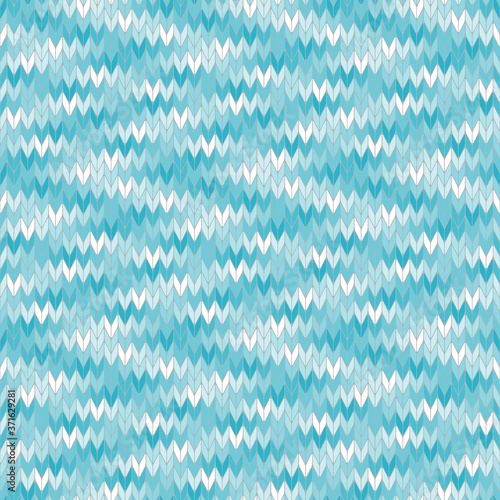 Seamless knitted pattern of blue and white. Handmade knitted textile imitation. Abstract geometric background