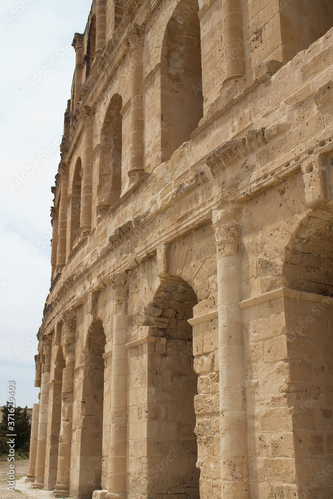Naklejka premium El Djem Tunisia, roman amphitheatre external facade and arches