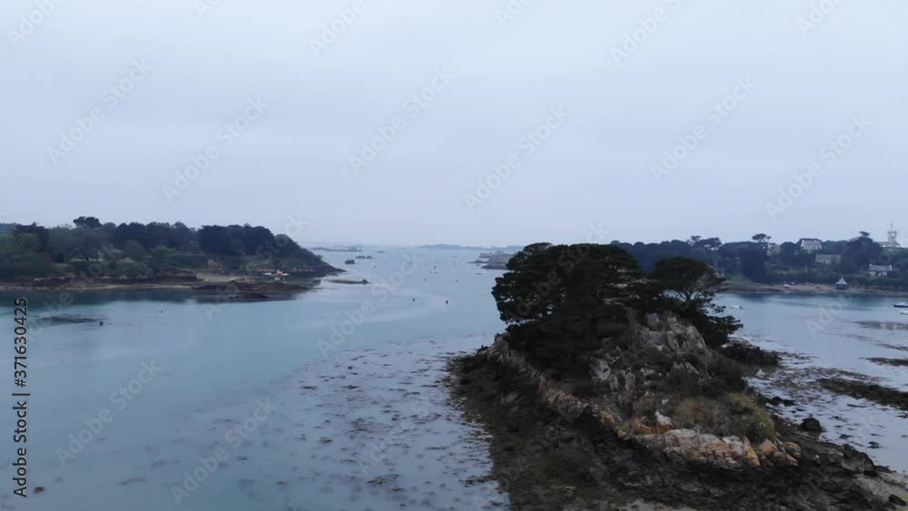 beautiful drone view of Bréhat, an archipelago composed of two main islands, separated only at high tide, and many smaller ones. It is famous for its pink granite rocks, very mild micro-climat beautiful drone view of Bréhat, an archipelago composed of two main islands, separated only at high tide, and many smaller ones. It is famous for its pink granite rocks, very mild micro-climat