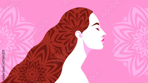 Beautiful female head with long hair. Mandalas decorate the hair and background behind. The concept of meditation, mental health, mindfulness and awareness. Female silhouette on pink background. 