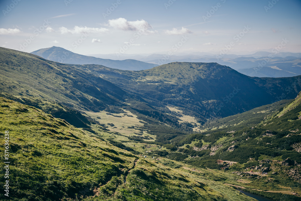 A view of a large mountain in the background