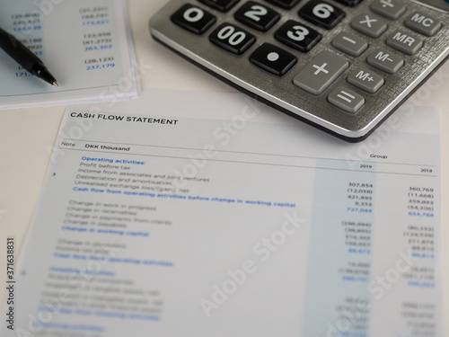 Принти на полотні Financial statement concept:Cash flow statement paper sheet with calculator and pen