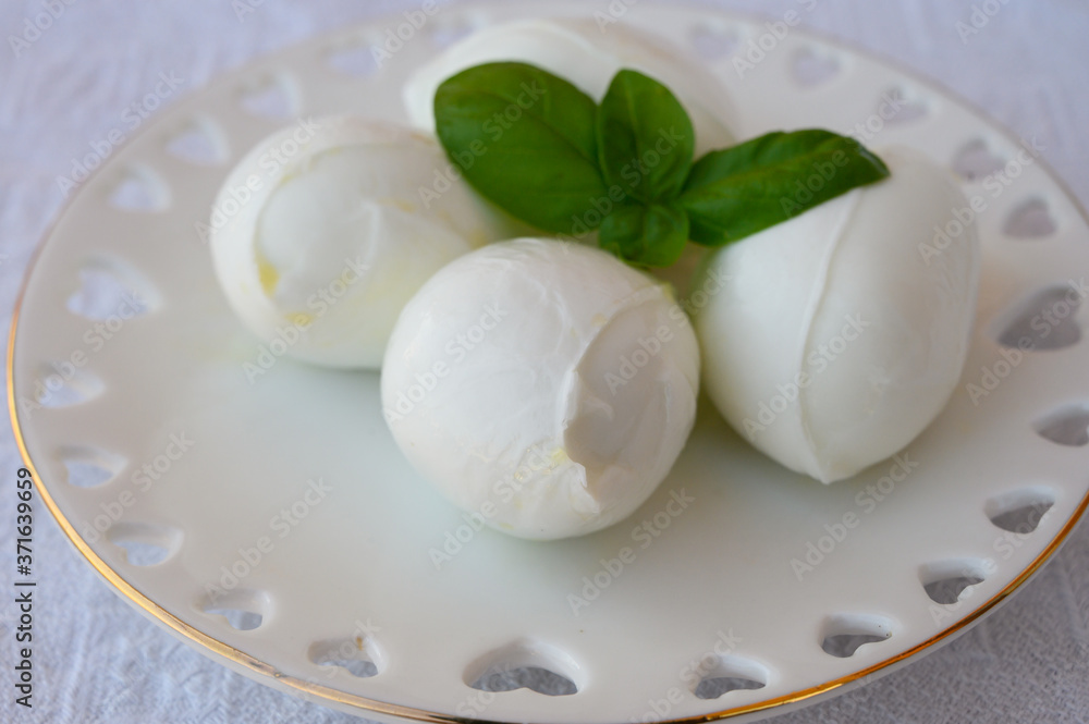 Fresh soft white italian cheese mozzarella buffalo made from Italian buffalo's milk by pasta filata method Fresh soft white italian cheese mozzarella buffalo made from Italian buffalo's milk by pasta filata method