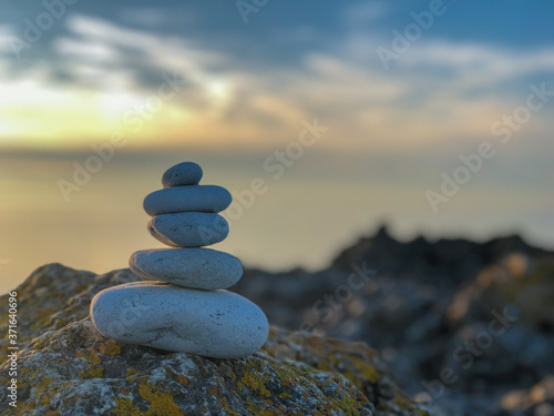 stack of stones on beach photo