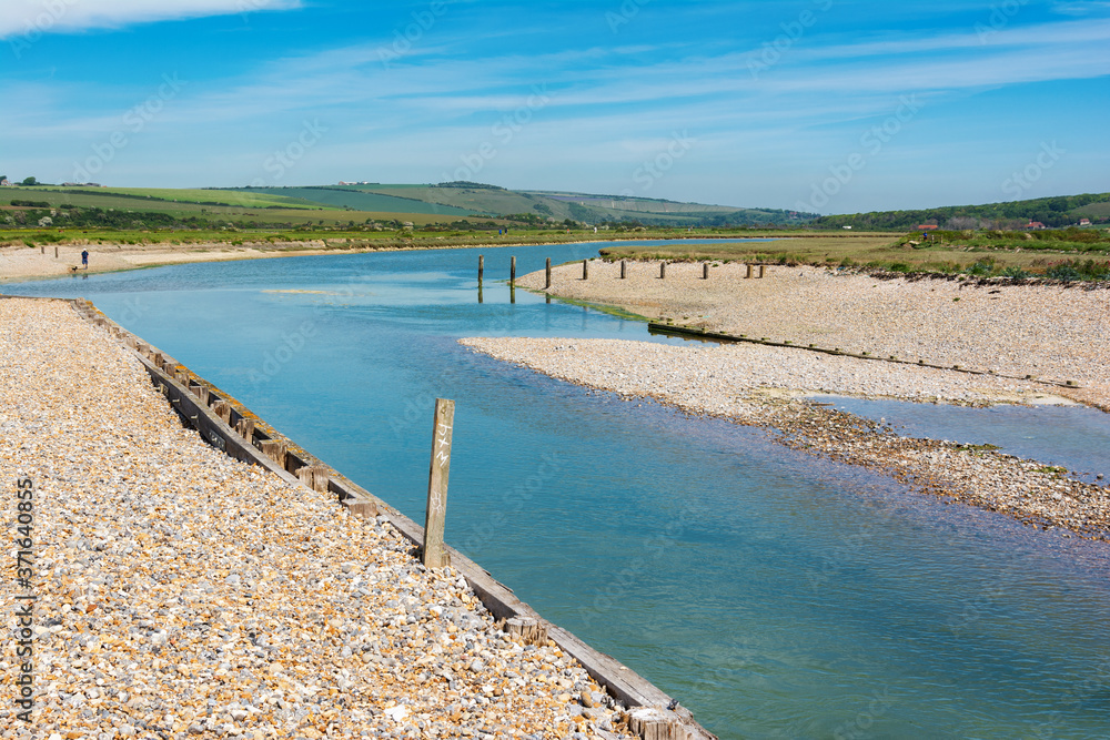 Views of Cucmere river near Seaford and Eastbourne, East Sussex with Cuckmere Haven and Hope Gap beaches nearby, country walks, selective focus