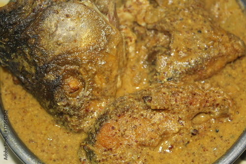 delicious fish curry tasty rohu fish curry in odia and bengali style delicous mustard fish curry machh besara photo