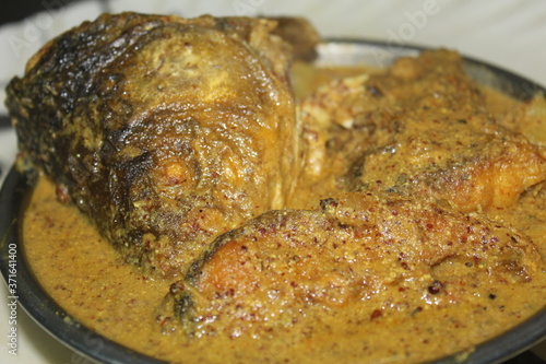 delicious fish curry tasty rohu fish curry in odia and bengali style delicous mustard fish curry machh besara photo