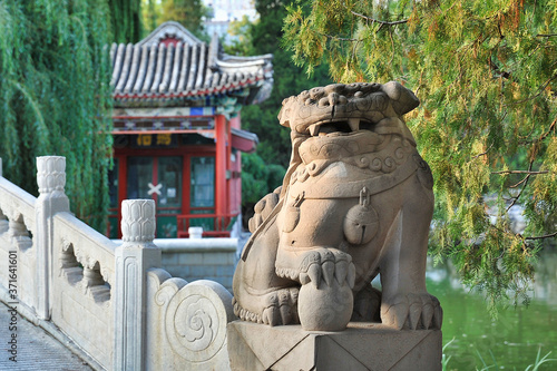 China, Beijing stone lion statues.