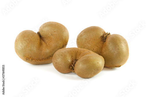 Three delicious kiwi original form isolated on white